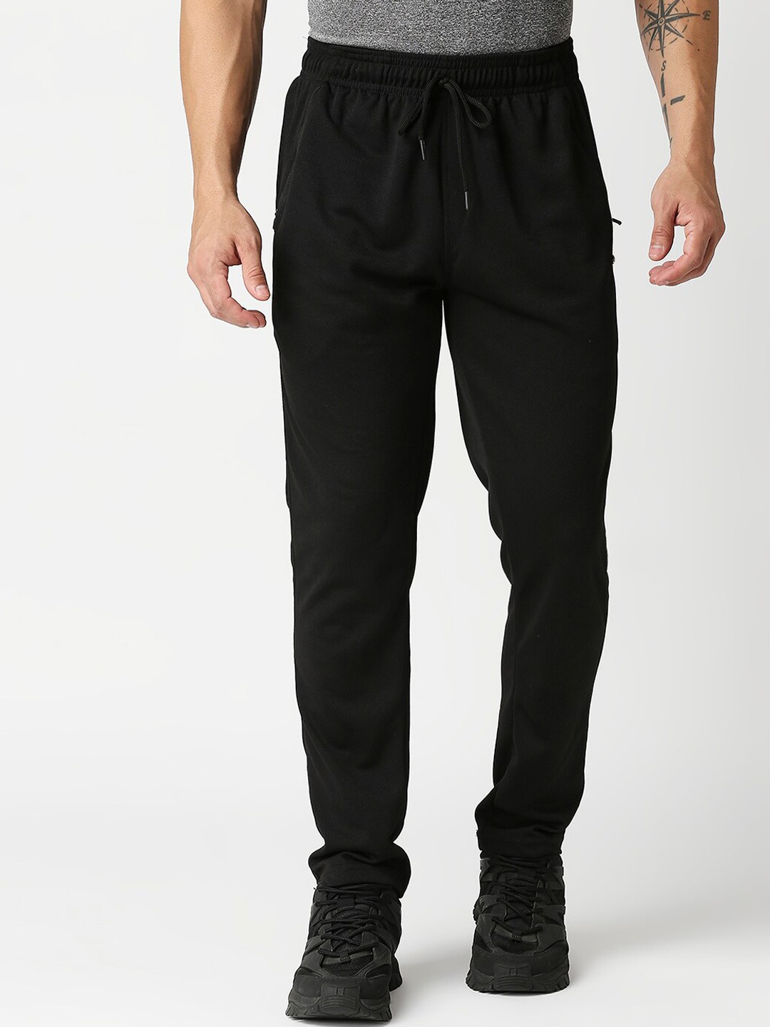 

Black Panther Men Black Solid Mid-Rise Track Pants