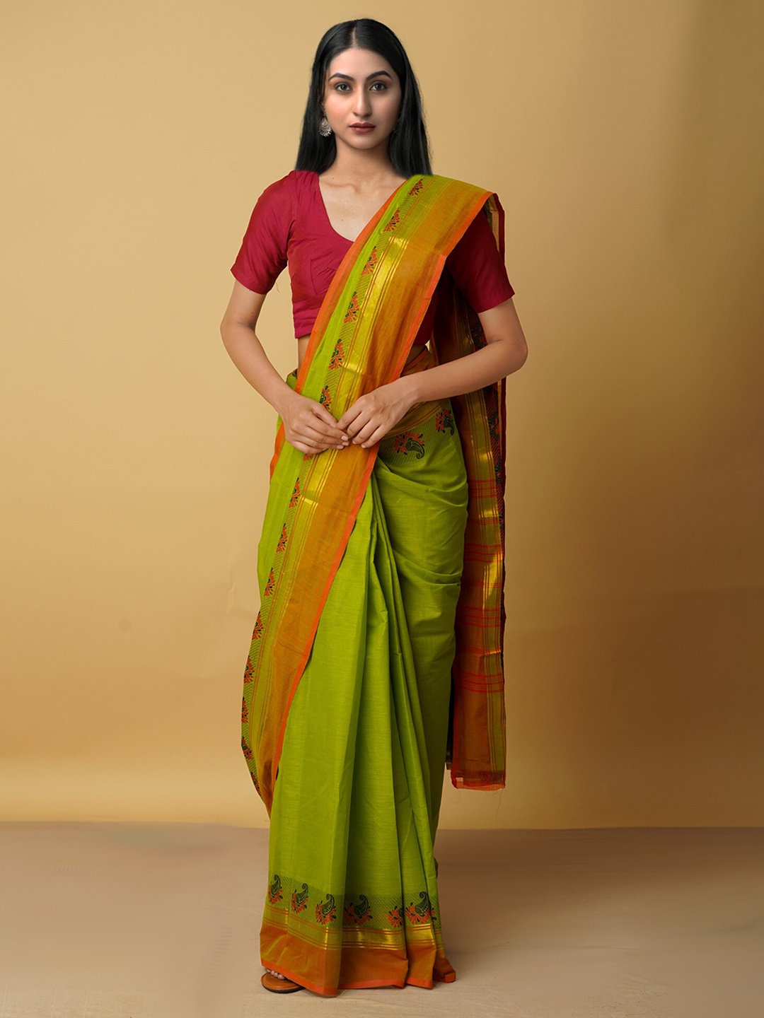 

Unnati Silks Green & Red Ethnic Motifs Zari Pure Cotton Kanjeevaram Saree