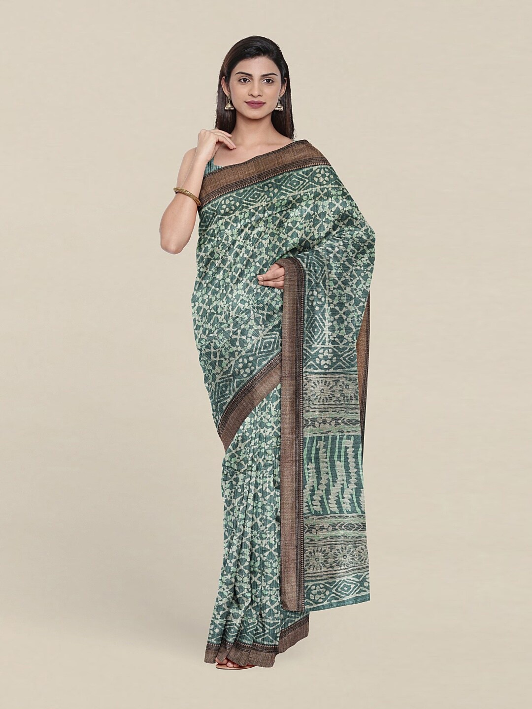 

Pothys Green & Brown Floral Jute Silk Saree