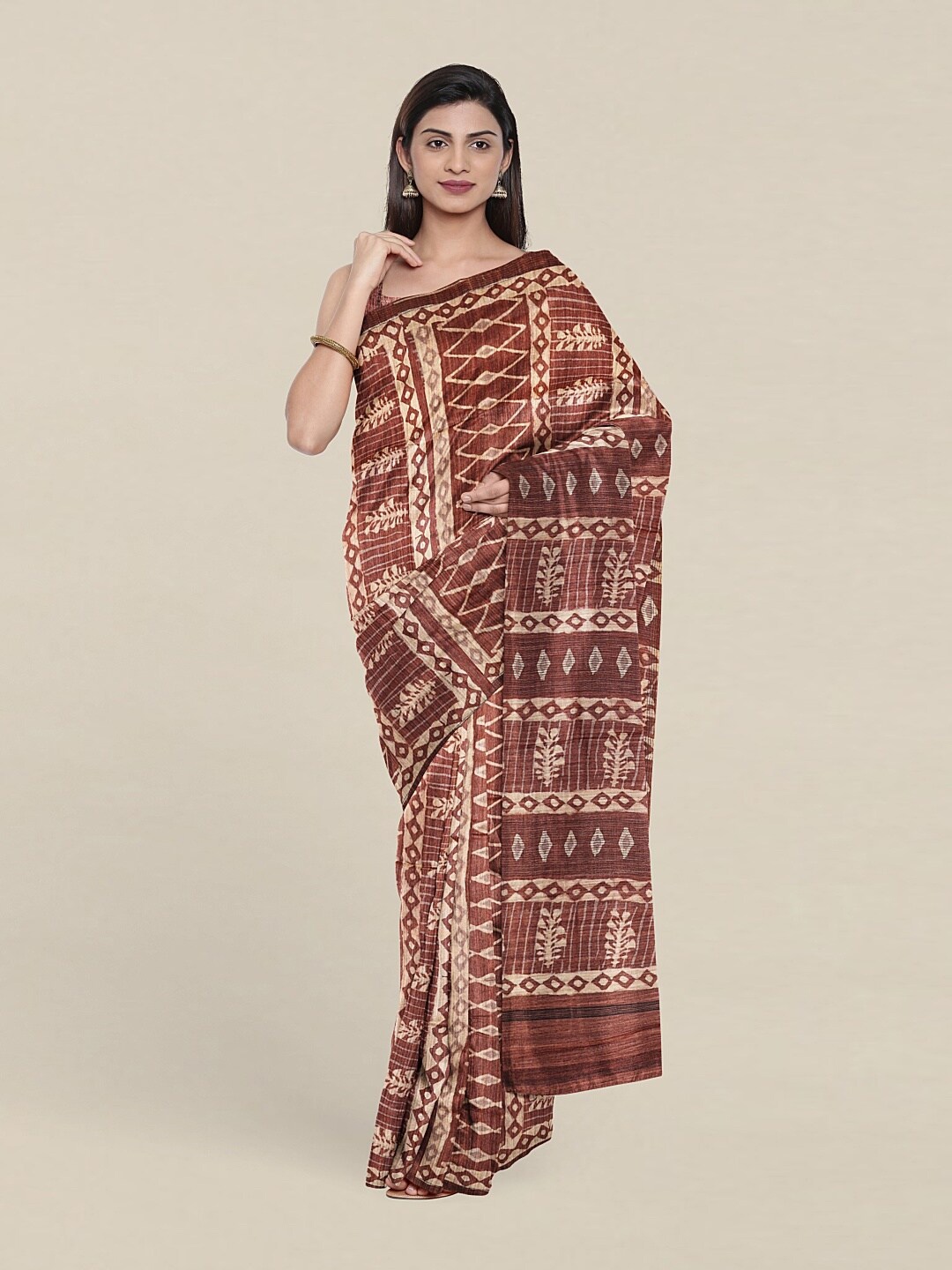 

Pothys Rust Floral Jute Silk Saree