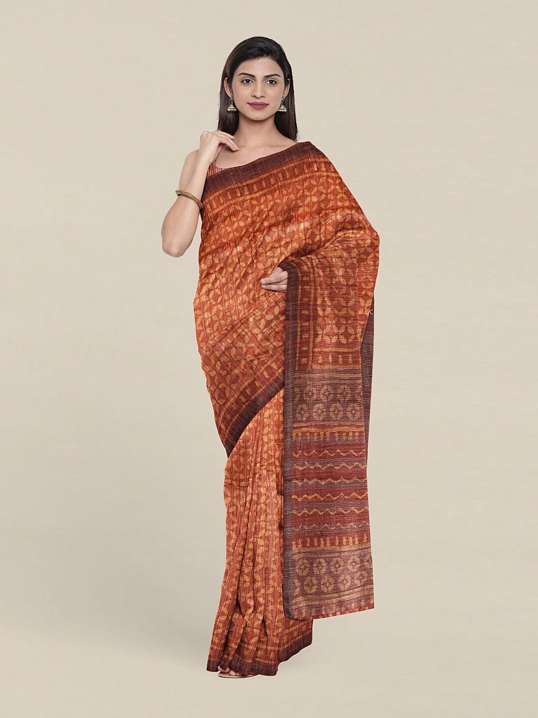 

Pothys Rust & Brown Ethnic Motifs Jute Silk Saree