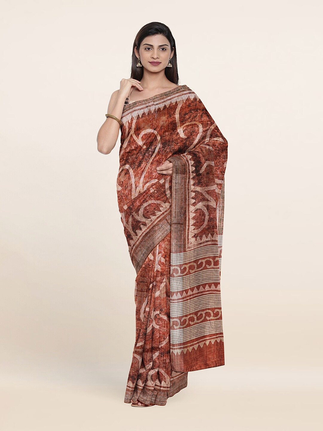 

Pothys Rust Ethnic Motifs Jute Silk Saree