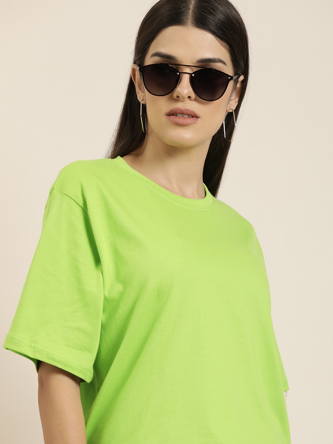 

Difference of Opinion Women Green Solid Pure Cotton Oversized T-shirt