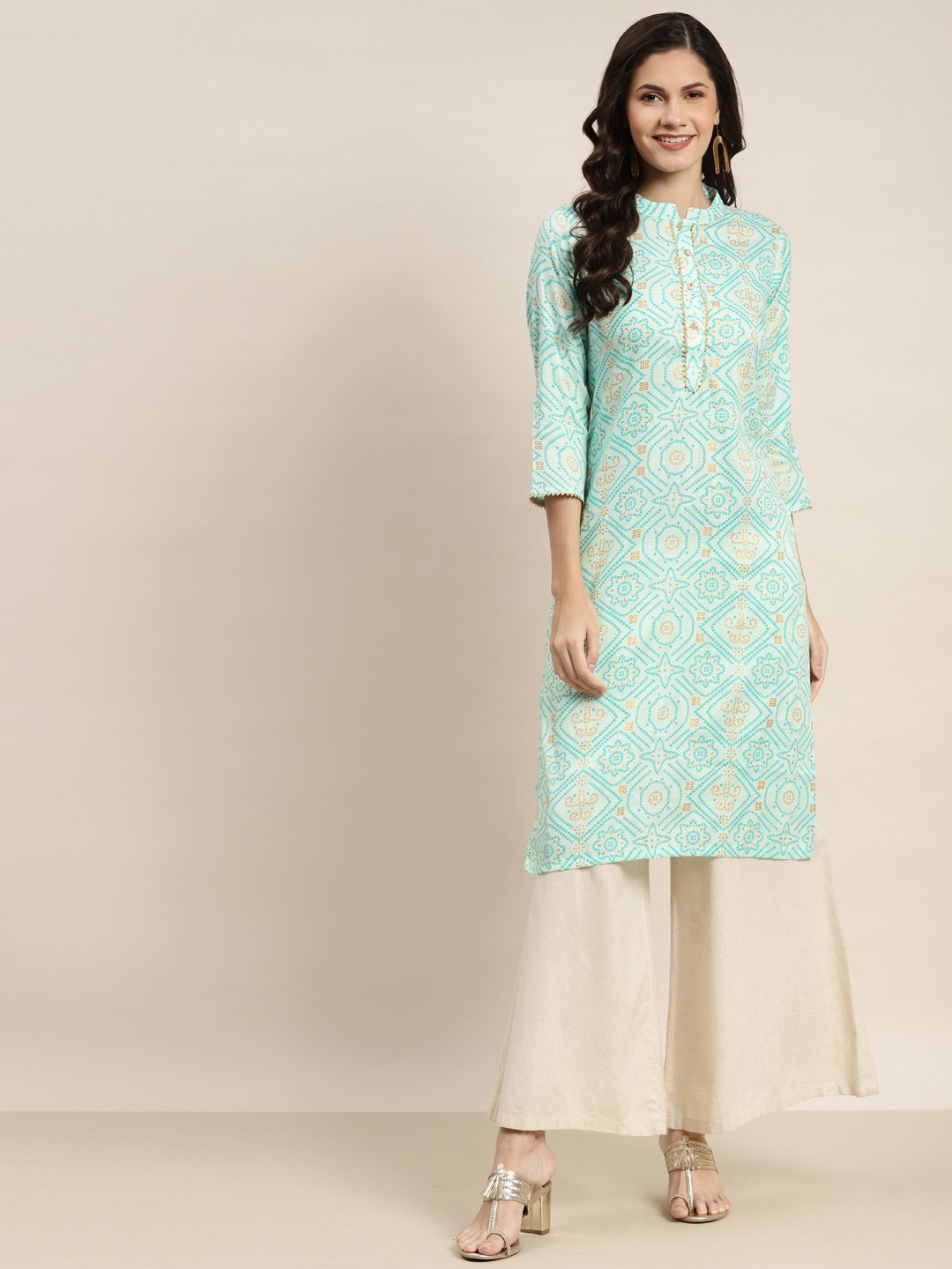 

Jompers Women Sea Green Bandhani Printed Gotta Patti Cotton Kurta