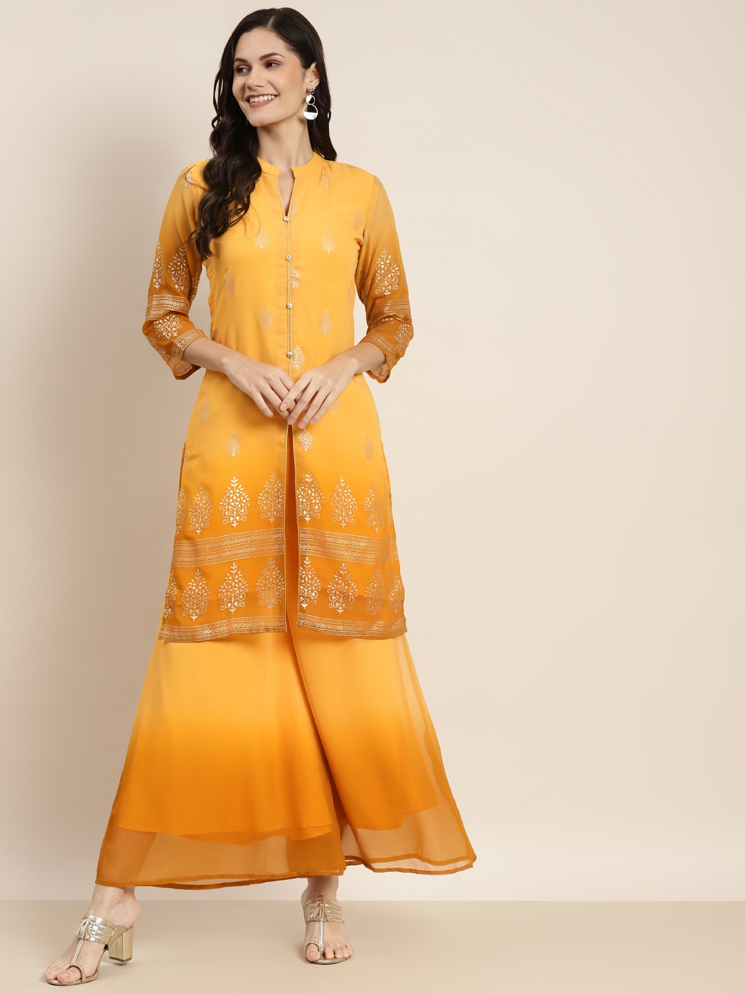 

Jompers Women Yellow Floral Printed Kurta with Palazzos