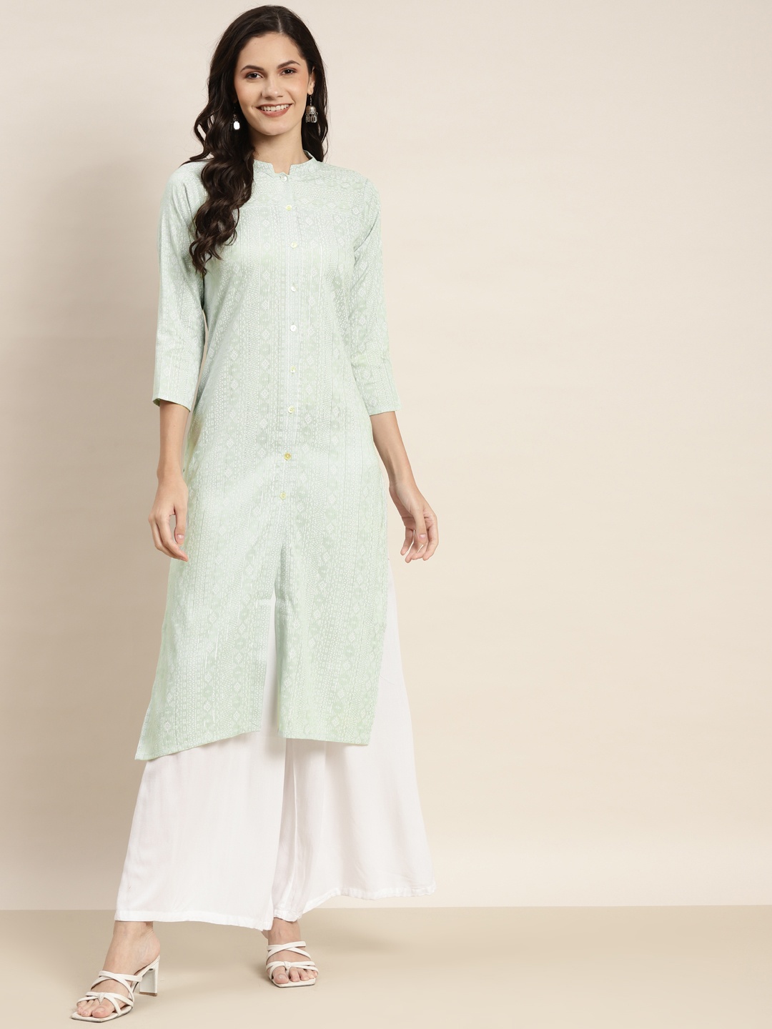 

Jompers Women Mint Green & Off White Ethnic Motifs Printed Lurex Kurta