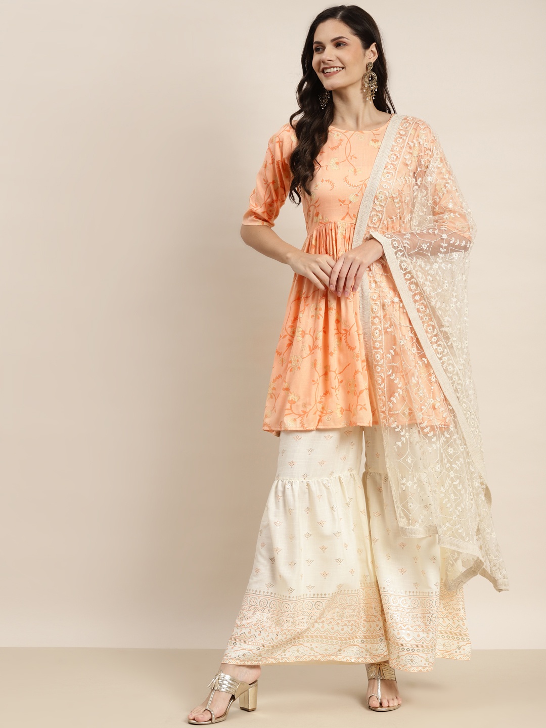 

Jompers Women Orange Ethnic Motifs Printed Empire Kurta with Sharara & Dupatta