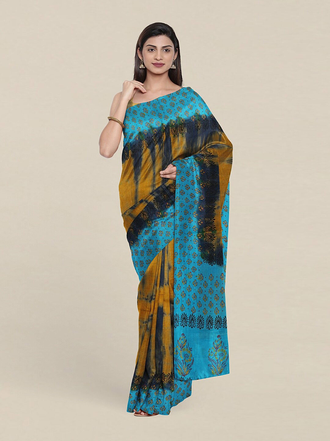 

Pothys Blue & Brown Floral Pure Cotton Saree