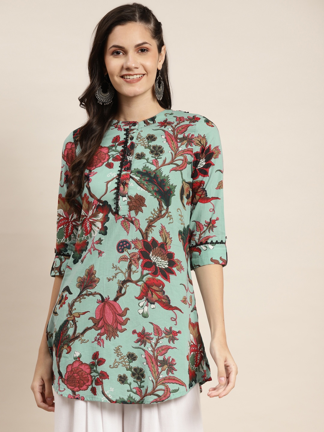

Rain & Rainbow Turquoise Blue & Pink Floral Printed Pure Cotton Kurti