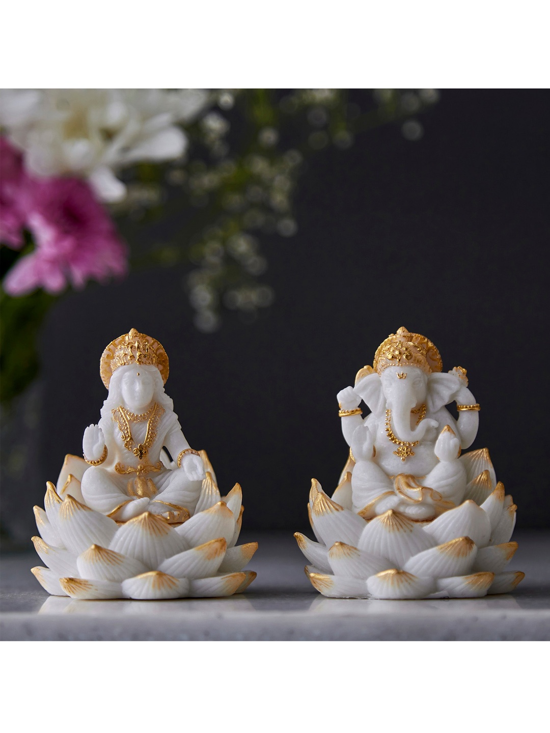 

Home Centre Set Of 2 White Dhayana Textured Polyresin Lakshmi Ganesha Showpieces