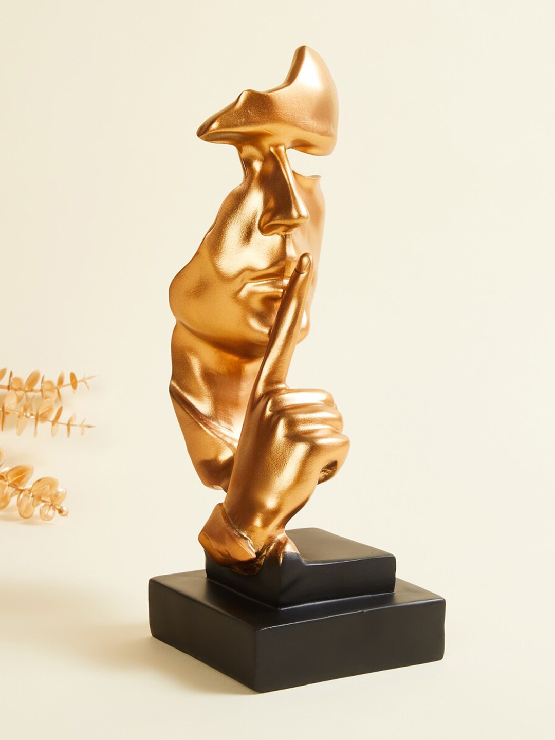 

Home Centre Gold-Toned Indicative Pose Face Figurine Showpieces