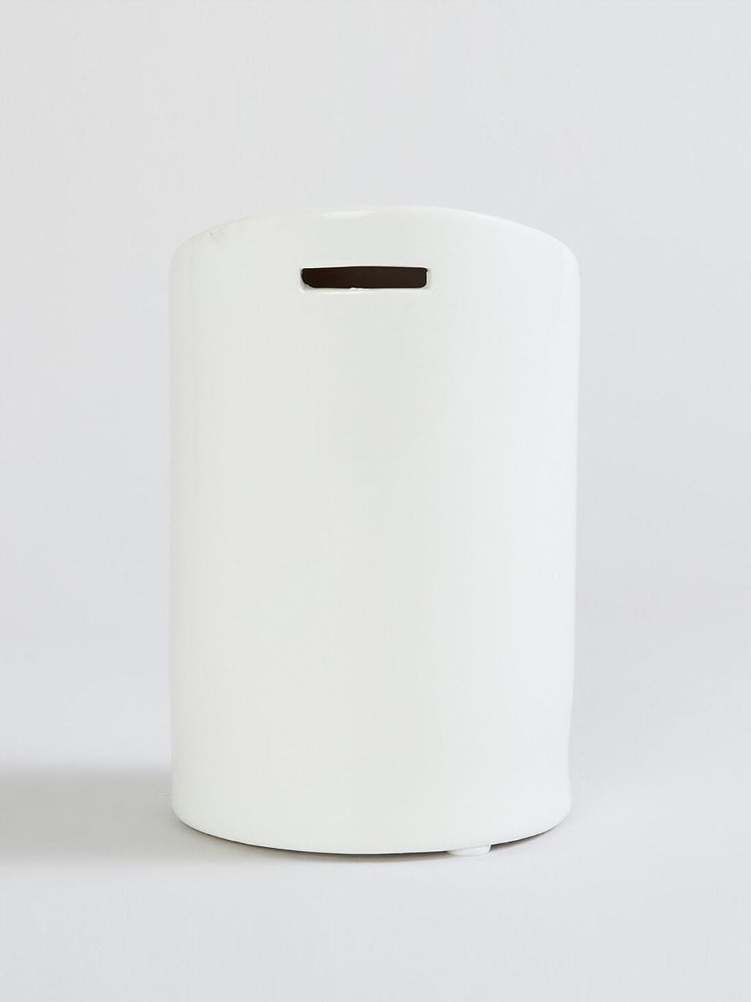 

Home Centre White Solid Piggy Bank Ceramic Showpieces