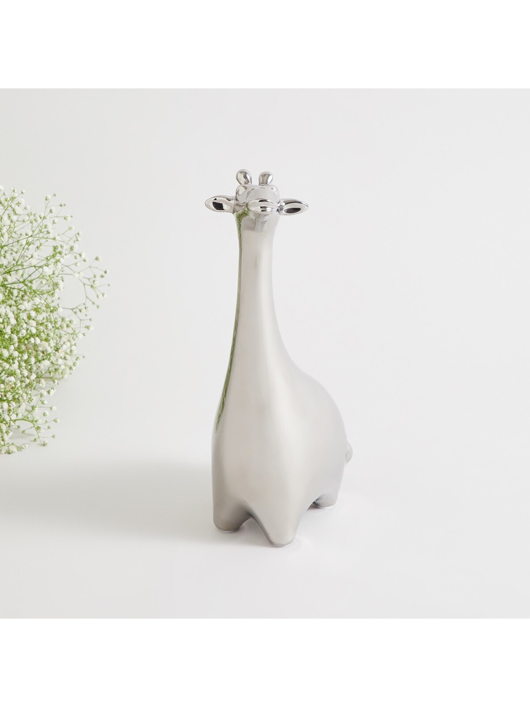 

Home Centre Silver-Colored Solid Ceramic Giraffe Showpieces