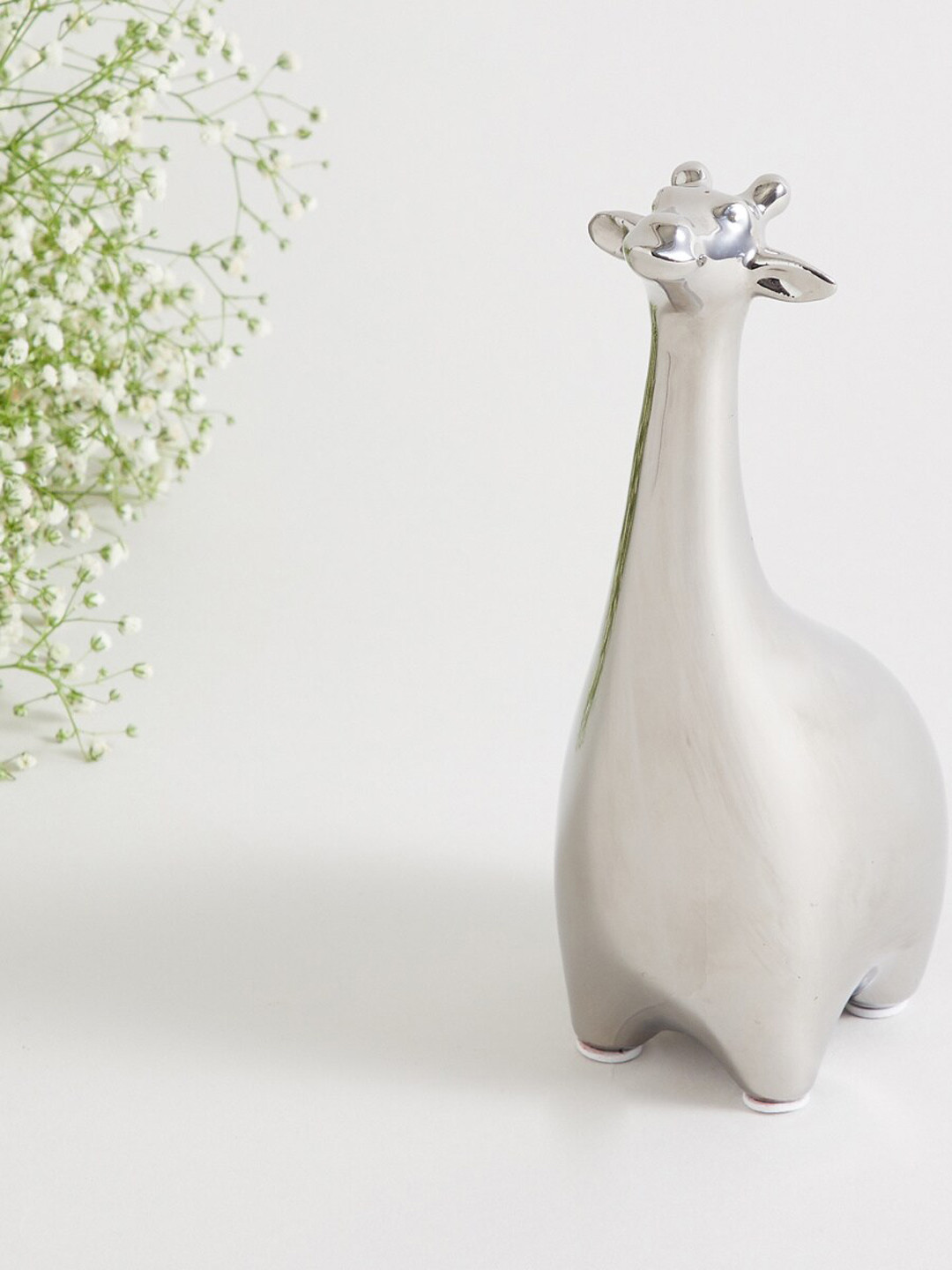 

Home Centre Silver-Toned Giraffe Figurine Showpieces