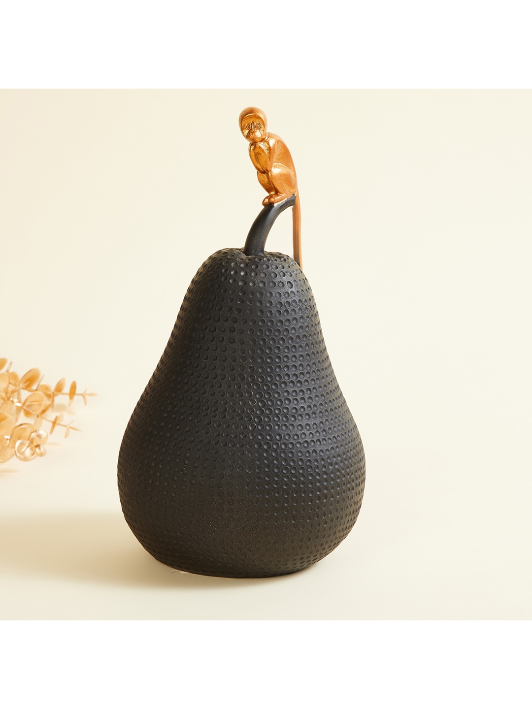 

Home Centre Black & Gold Monkey On Pear Figurine