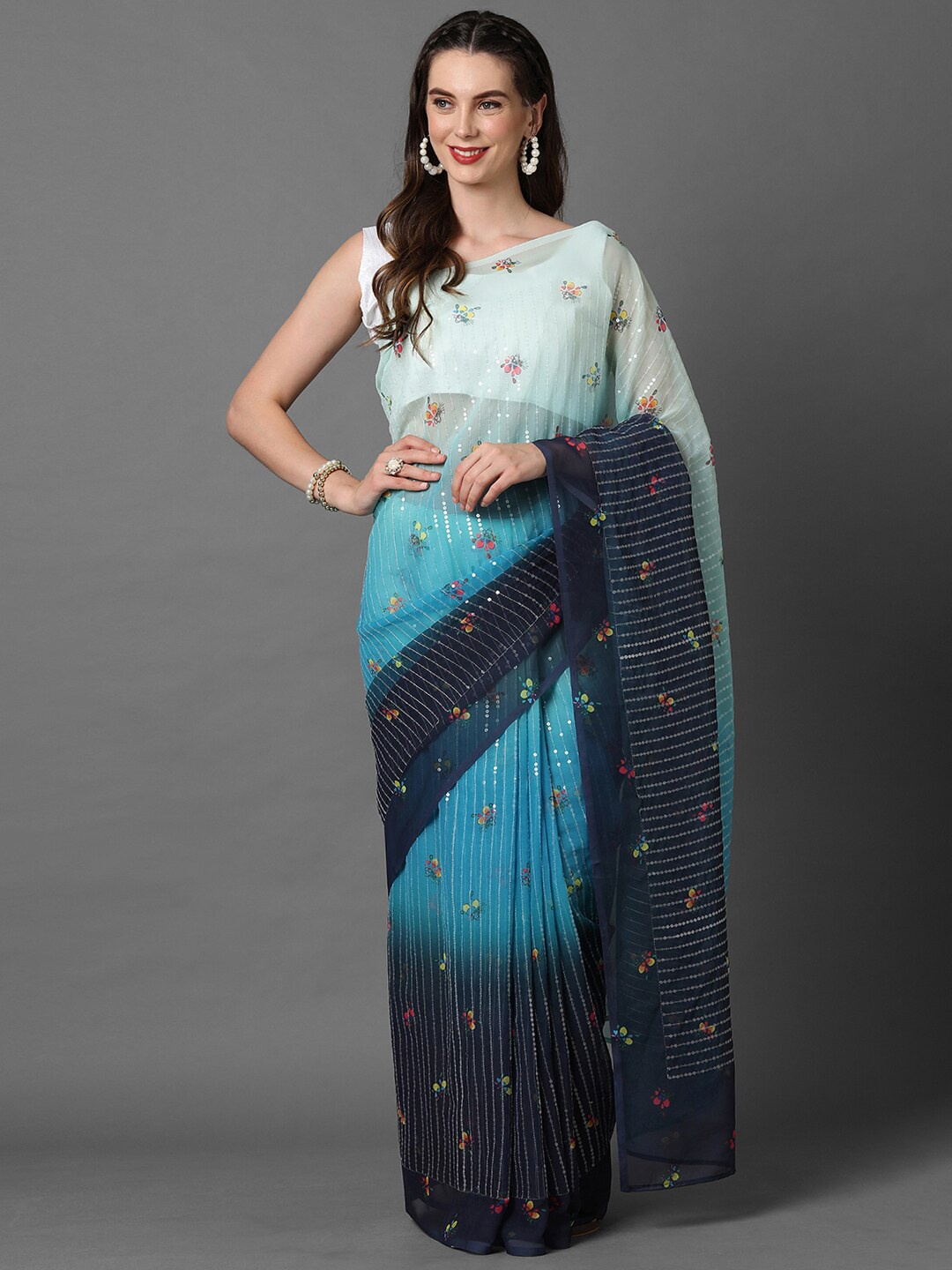 

Mitera Sea Green & Blue Embellished Sequined Pure Georgette Saree
