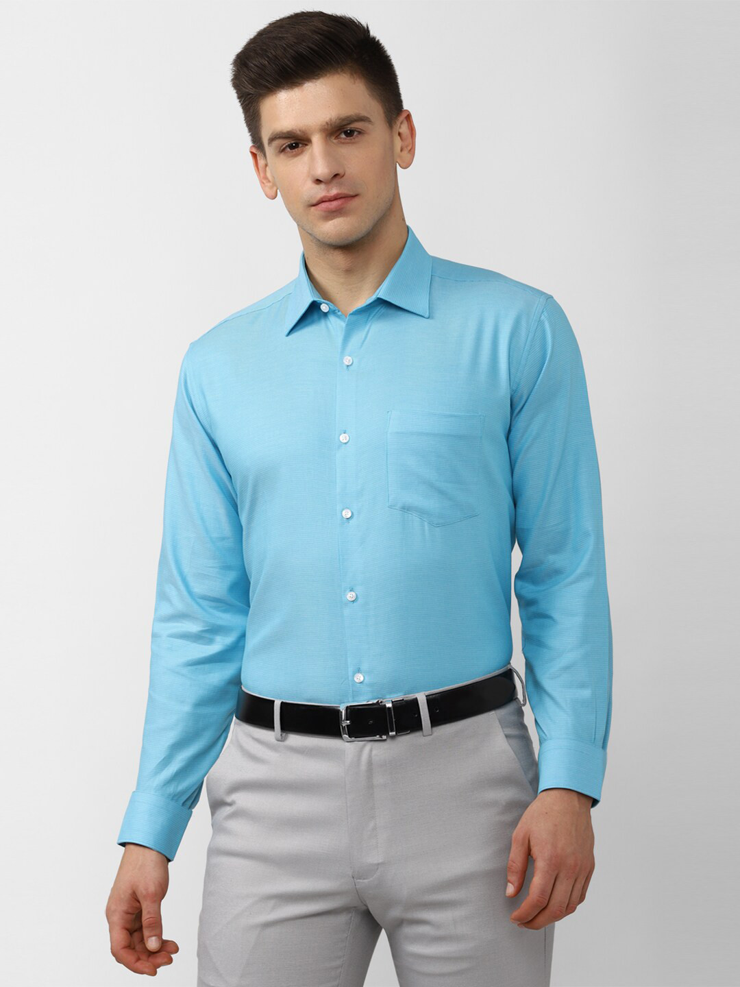 

Van Heusen Men Blue Solid Formal Shirt