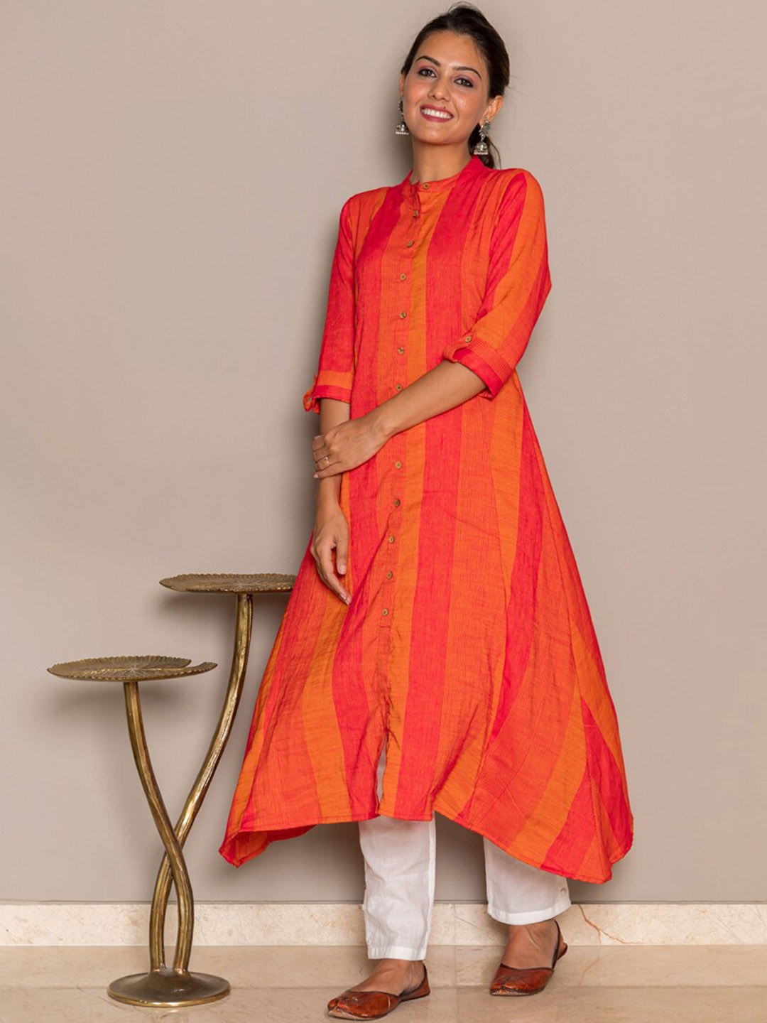 

CRAFTED FOR YOU Women Orange Striped Kurta with Trouser