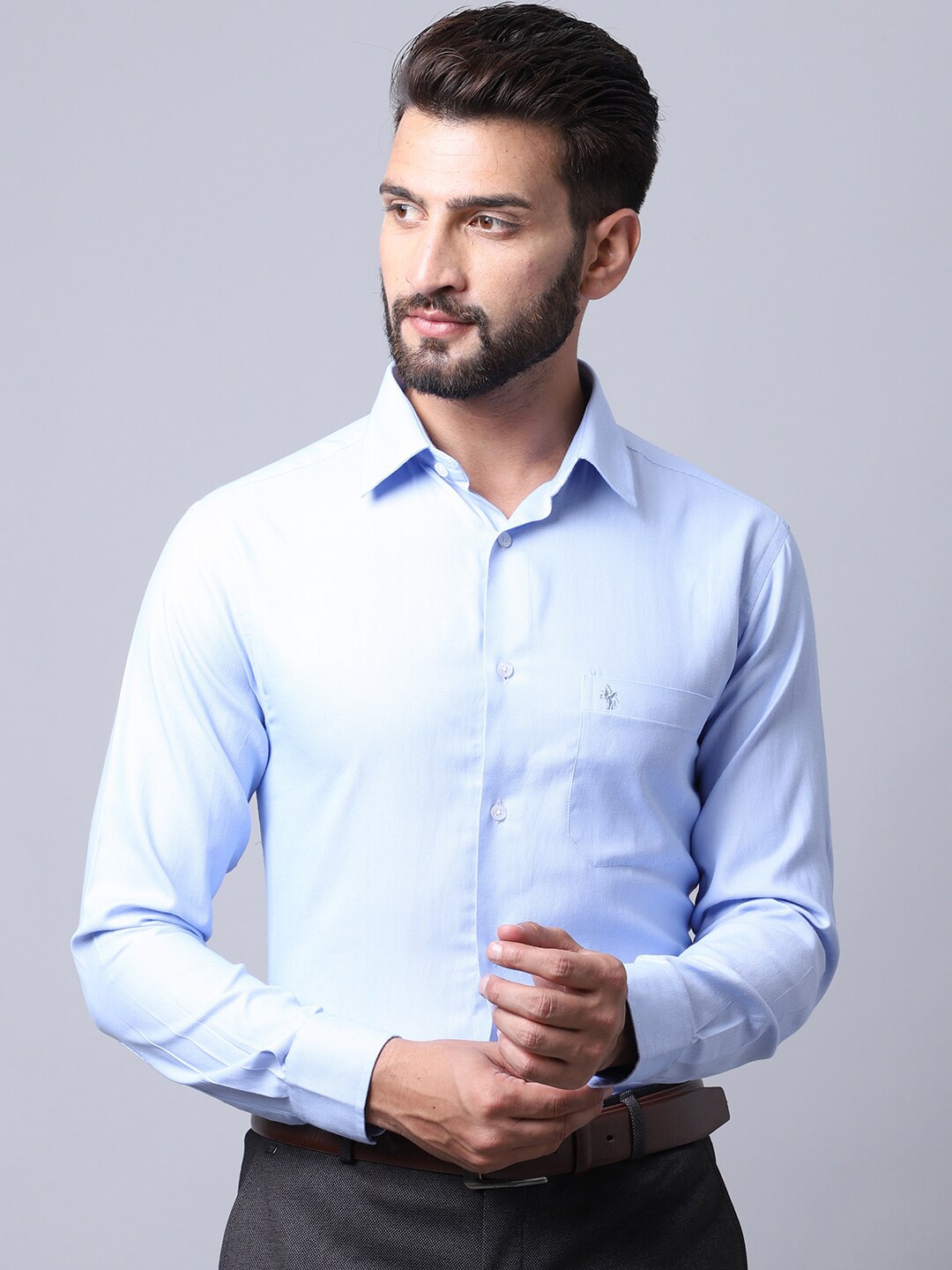 

Cantabil Men Blue Solid Formal Shirt