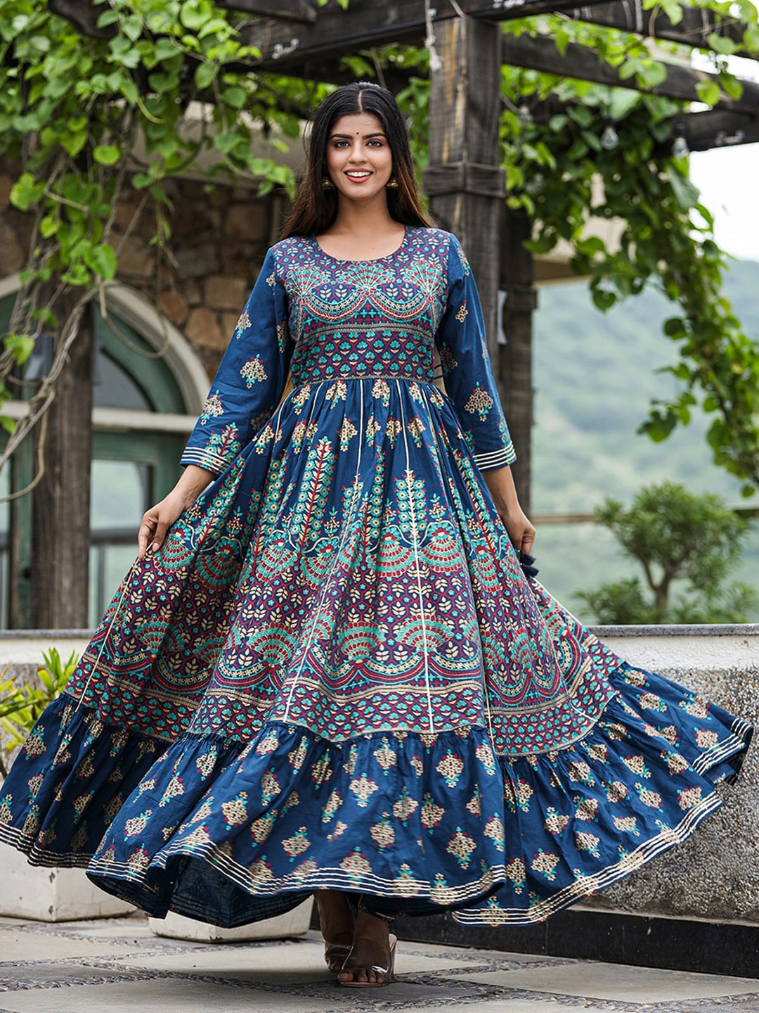 

KAAJH Women Blue Printed Pure Cotton Maxi Gown Ethnic Dresses