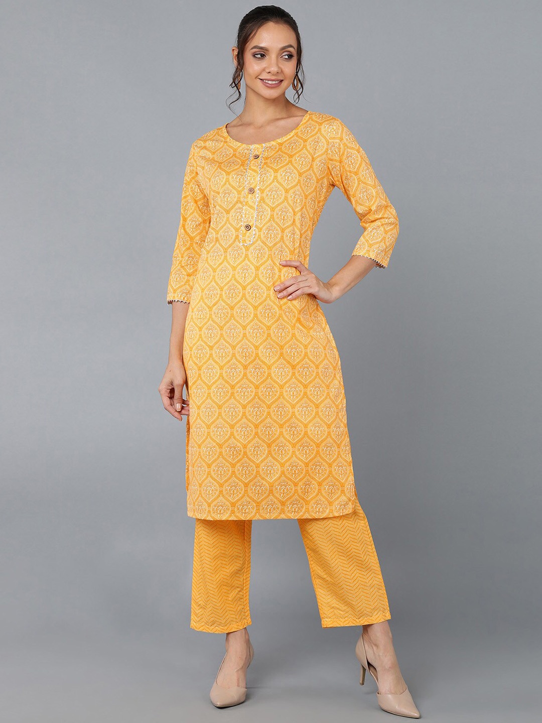 

kipek Women Yellow Ethnic Motifs Printed Kurta with Trousers