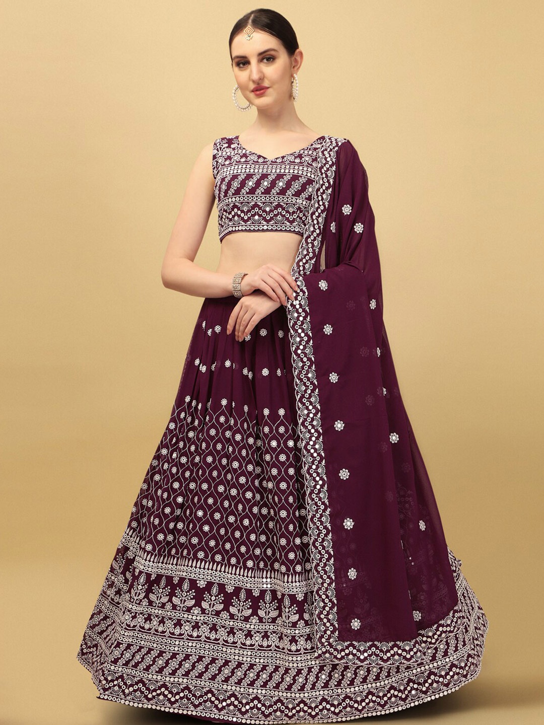 

Amrutam Fab Burgundy & Gold-Toned Embellished Mirror Work Semi-Stitched Lehenga & Unstitched Blouse With