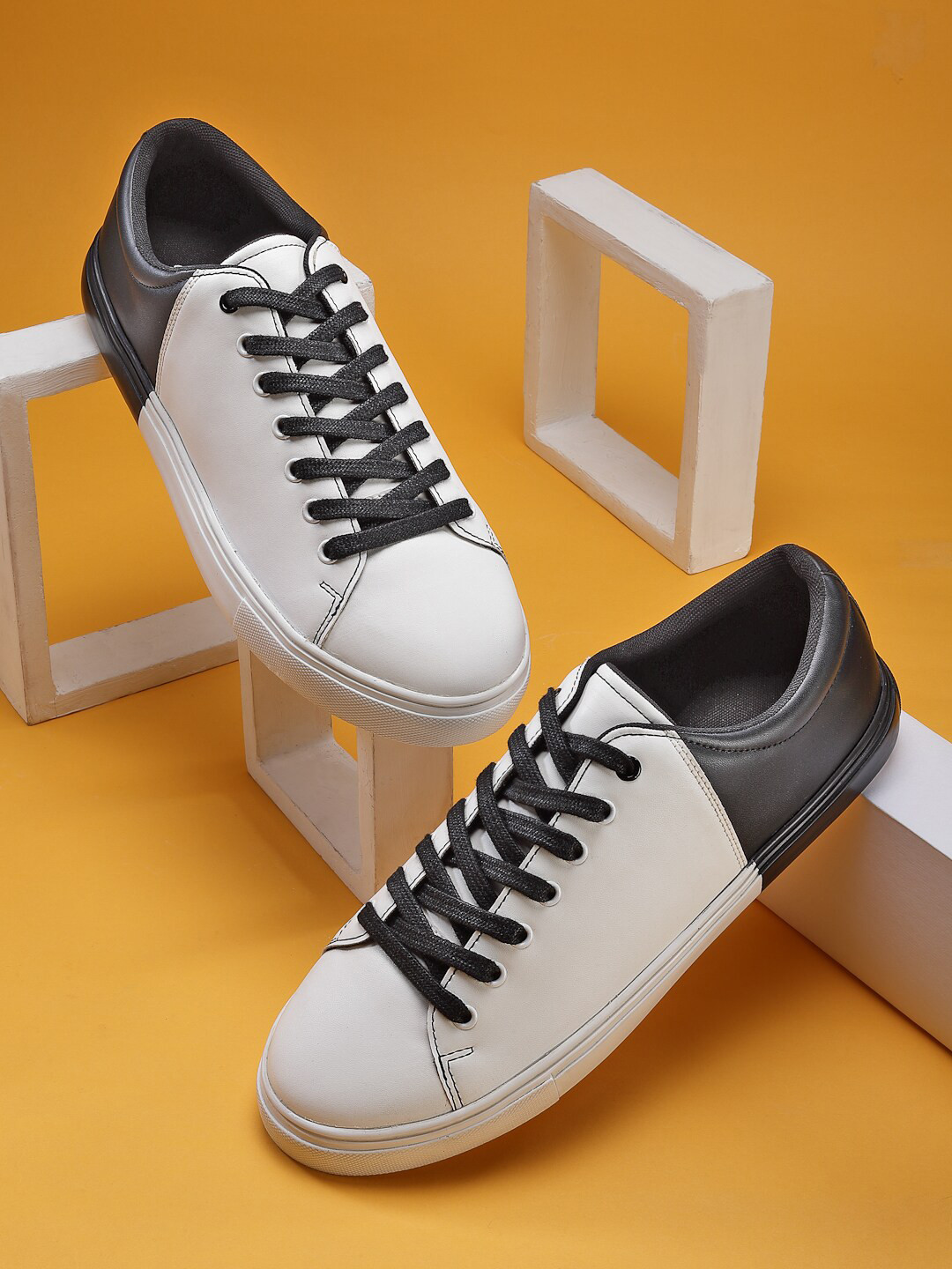 

Roadster Men White Colourblocked Sneakers