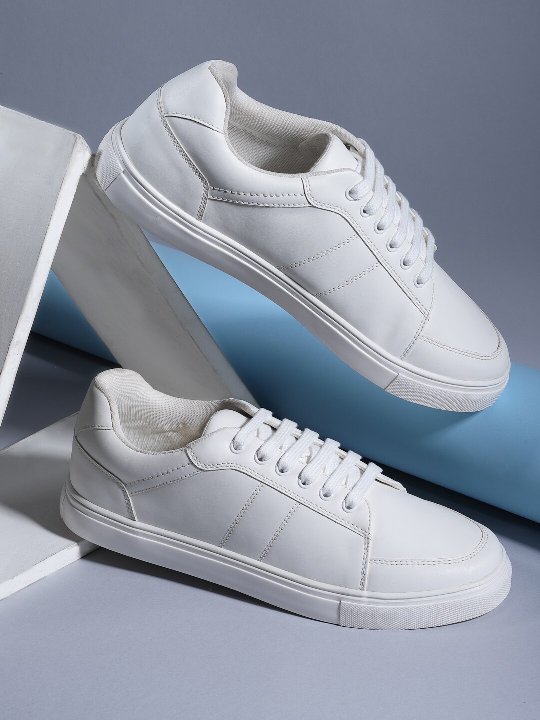 

Roadster Men White Solid Sneakers