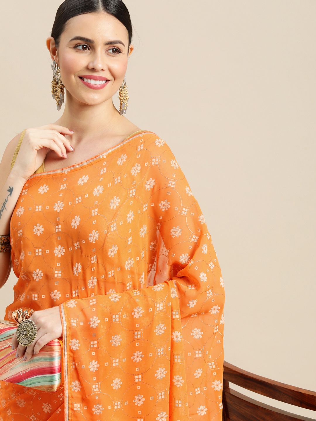 

Pothys Orange & White Ethnic Motifs Pure Chiffon Saree