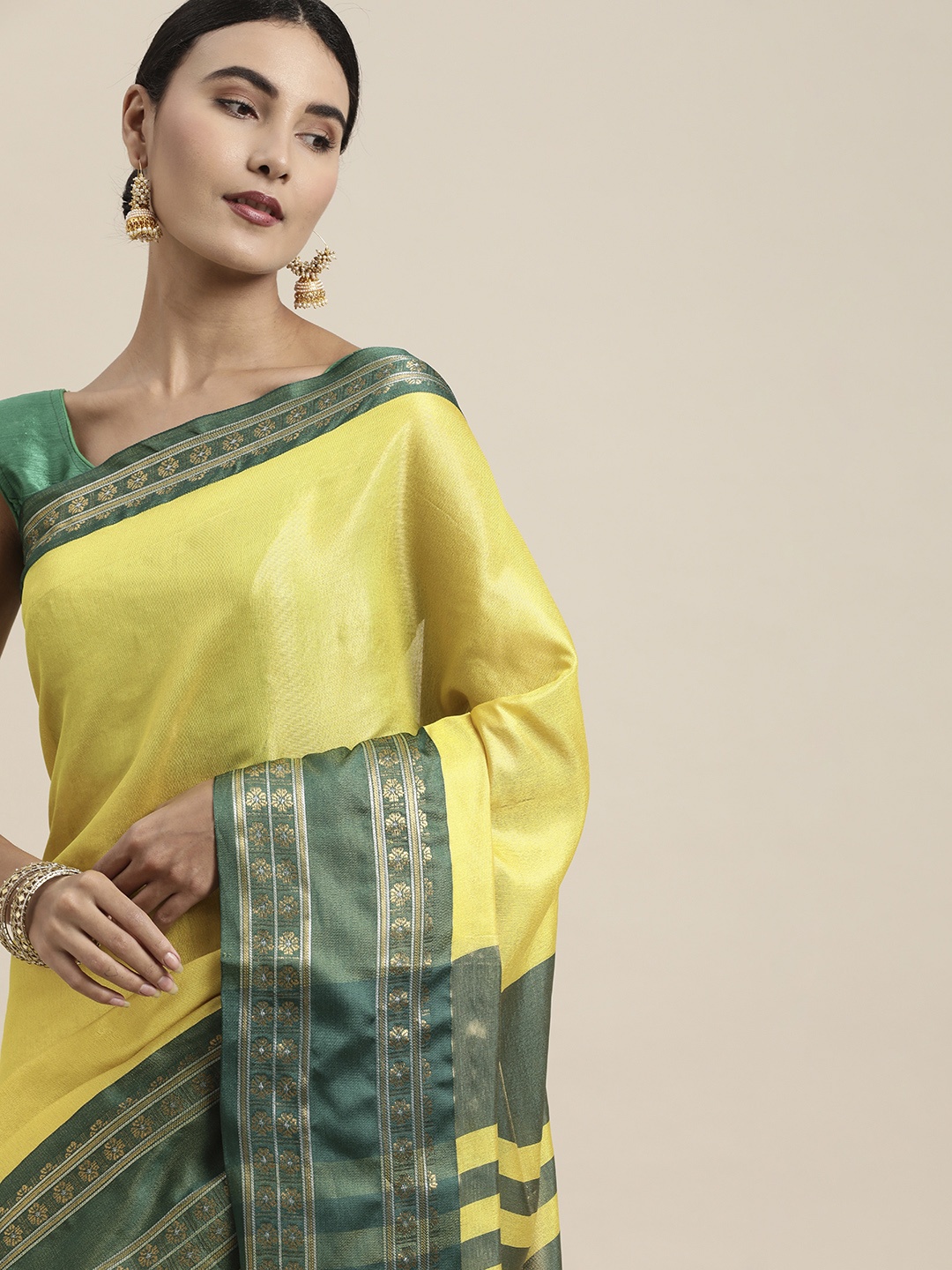 

Mitera Yellow & Green Woven Design Zari Silk Cotton Saree