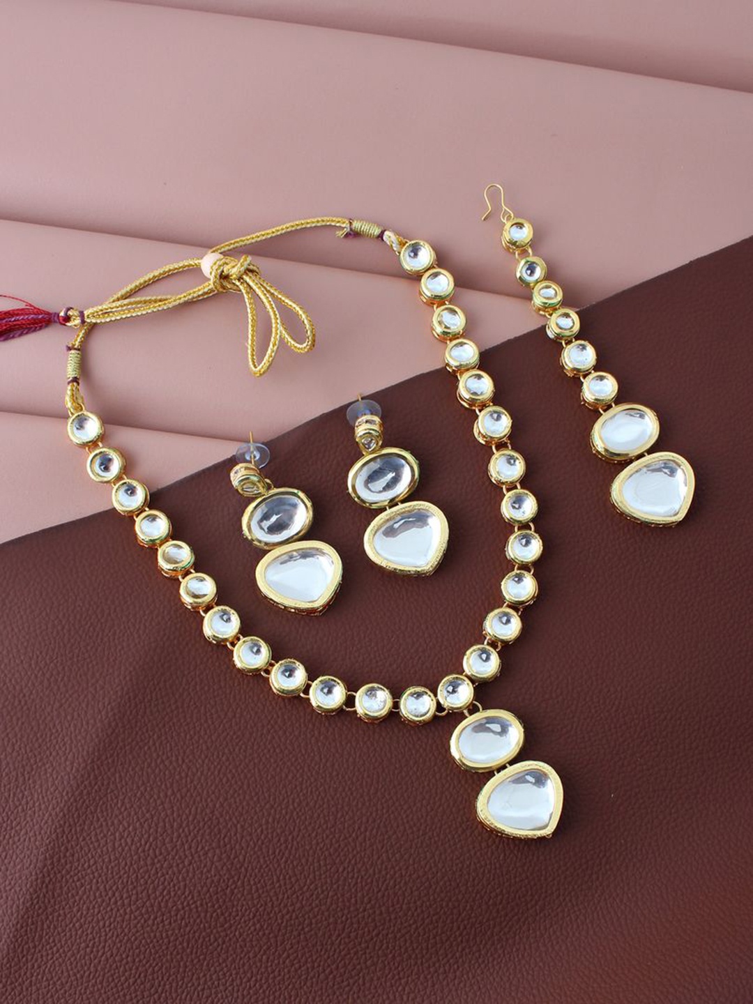 

LUCKY JEWELLERY Gold-Plated White Kundan Studded Jewellery Set