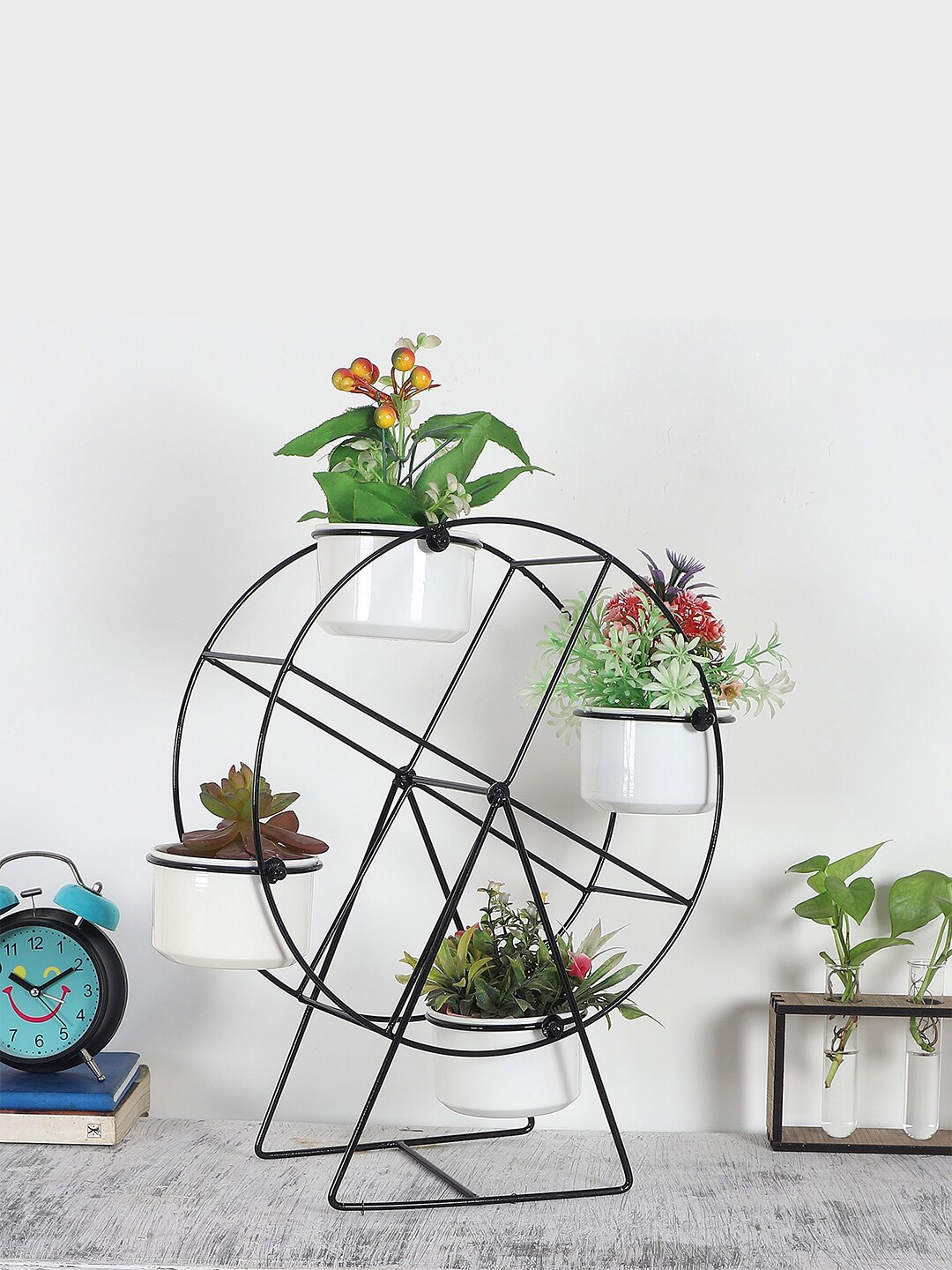 

Amaya Decors Black & White Solid Revolving Wheel Planter Stand