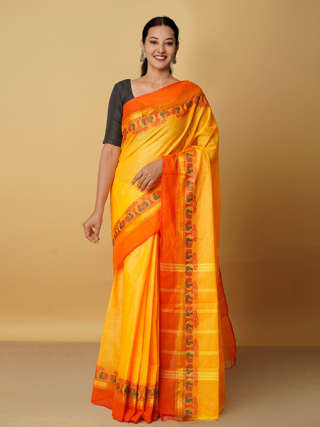 

Unnati Silks Orange Woven Design Zari Pure Cotton Kanjeevaram Saree