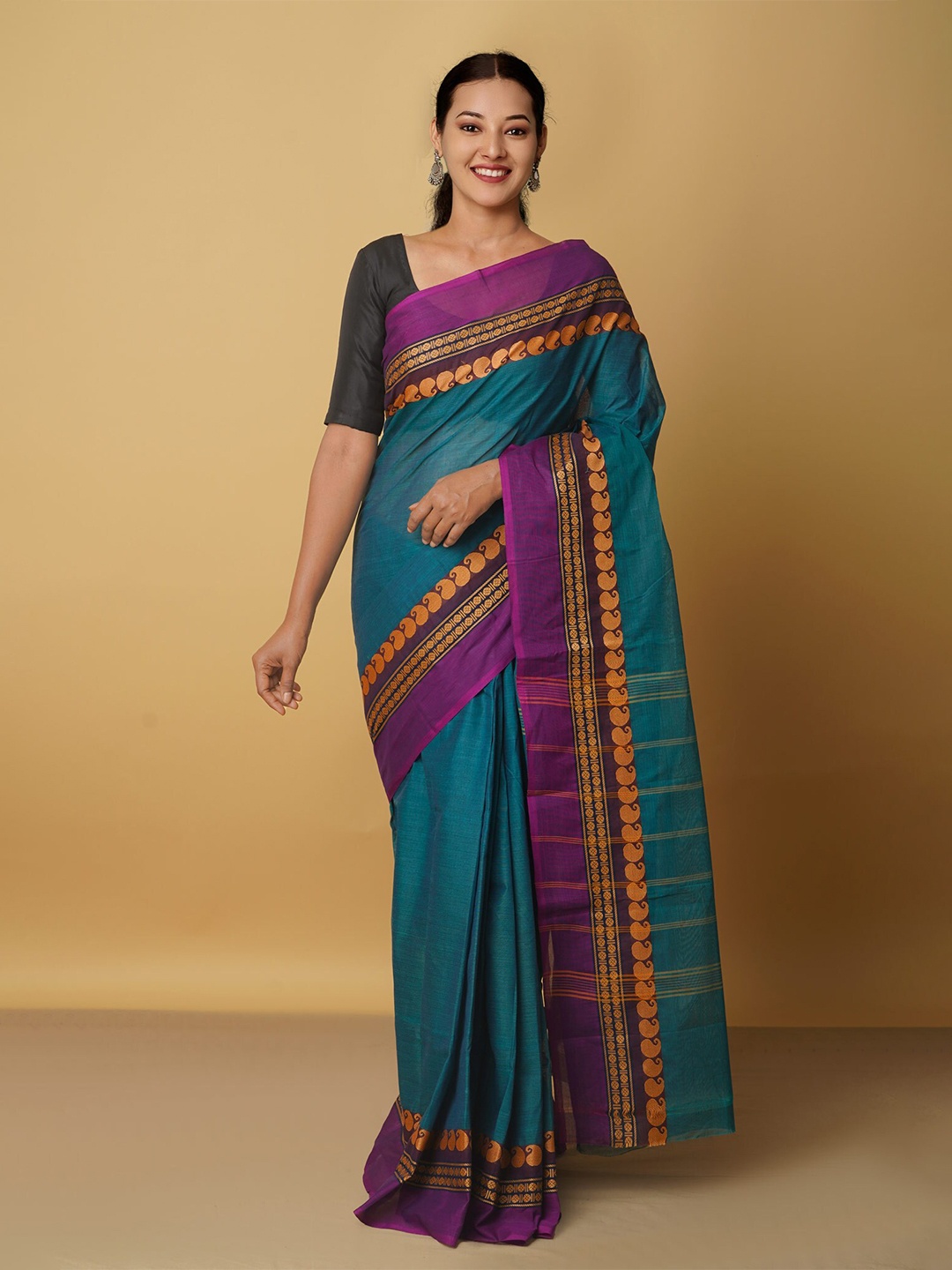 

Unnati Silks Women Purple & Green Ethnic Motifs Pure Cotton Kanjeevaram Saree