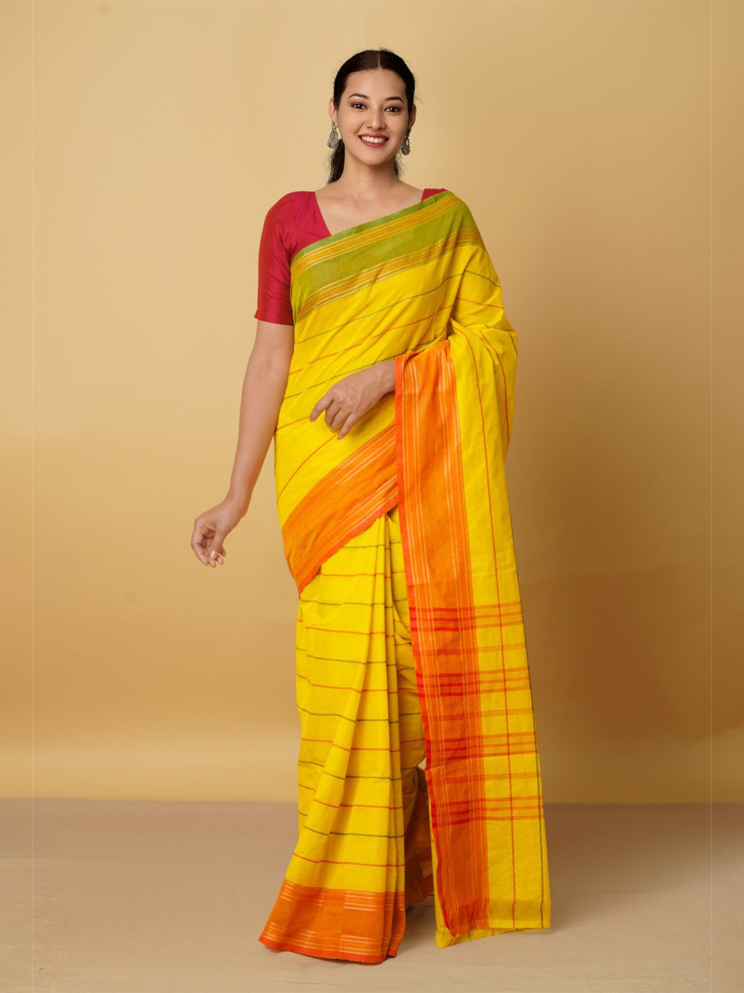 

Unnati Silks Yellow & Orange Striped Pure Cotton Kanjeevaram Saree