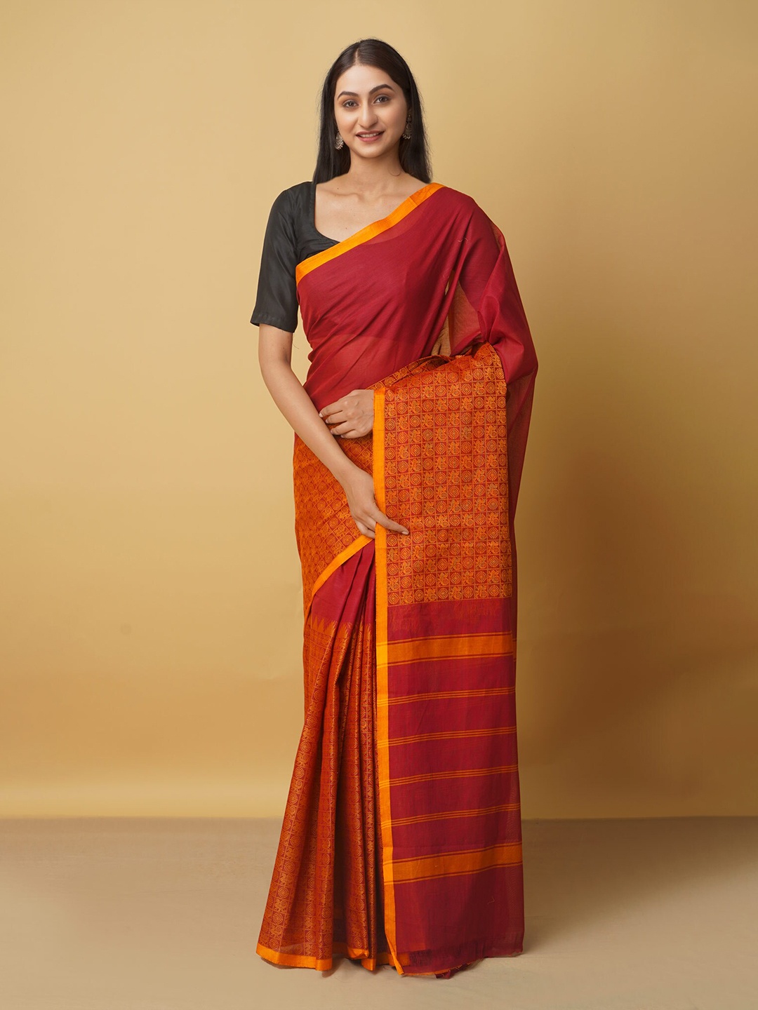 

Unnati Silks Maroon & Orange Zari Pure Cotton Kanjeevaram Saree