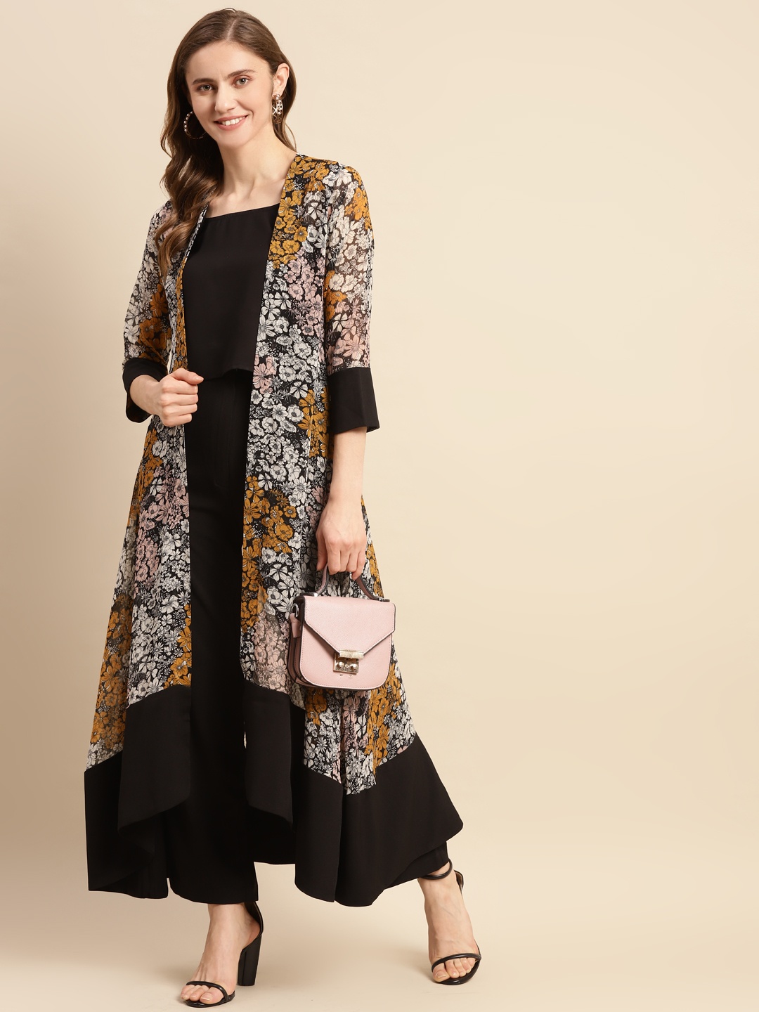 

WoowZerz Women Black & White Poly Chiffon Printed Longline Shrug