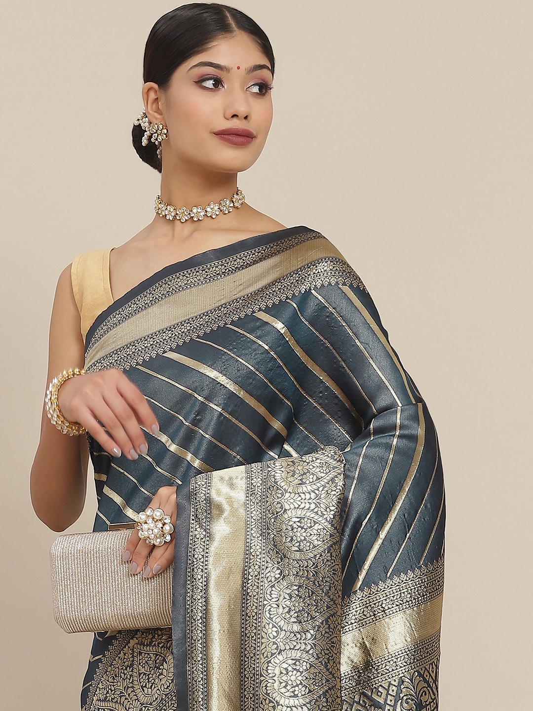 

Ishin Teal Leheriya Zari Silk Blend Saree