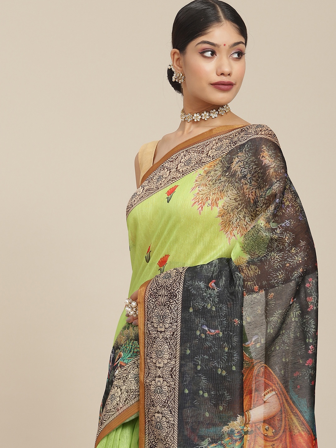 

Ishin Green & Black Ethnic Motifs Printed Saree
