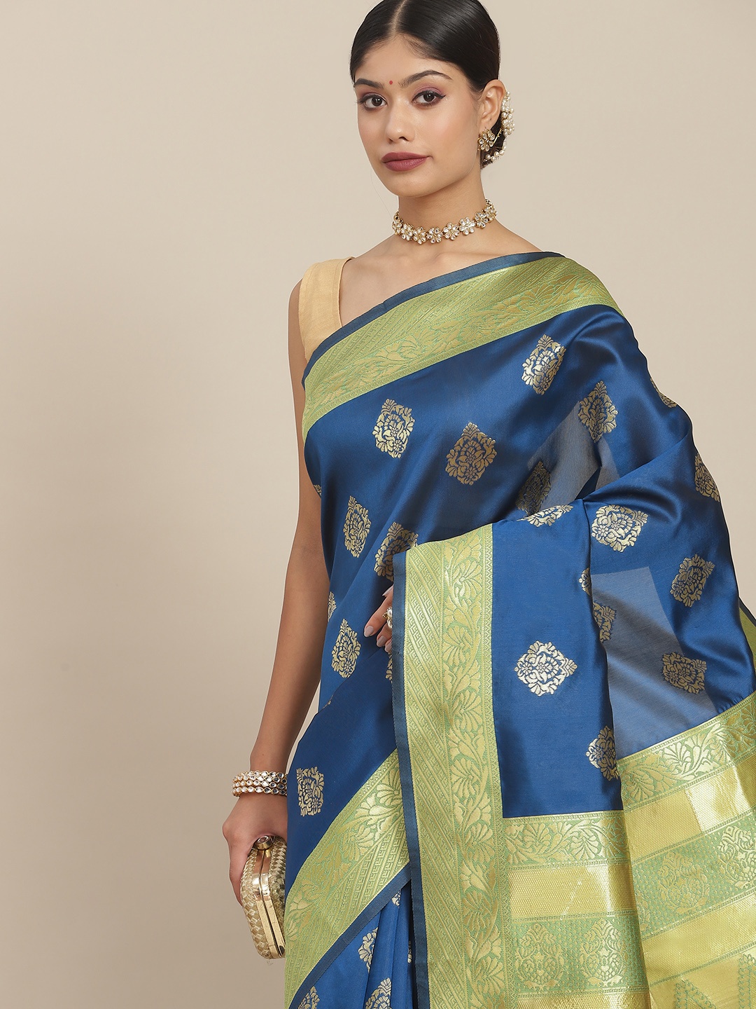 

Ishin Teal & Gold-Toned Ethnic Motifs Zari Silk Blend Mysore Silk Saree