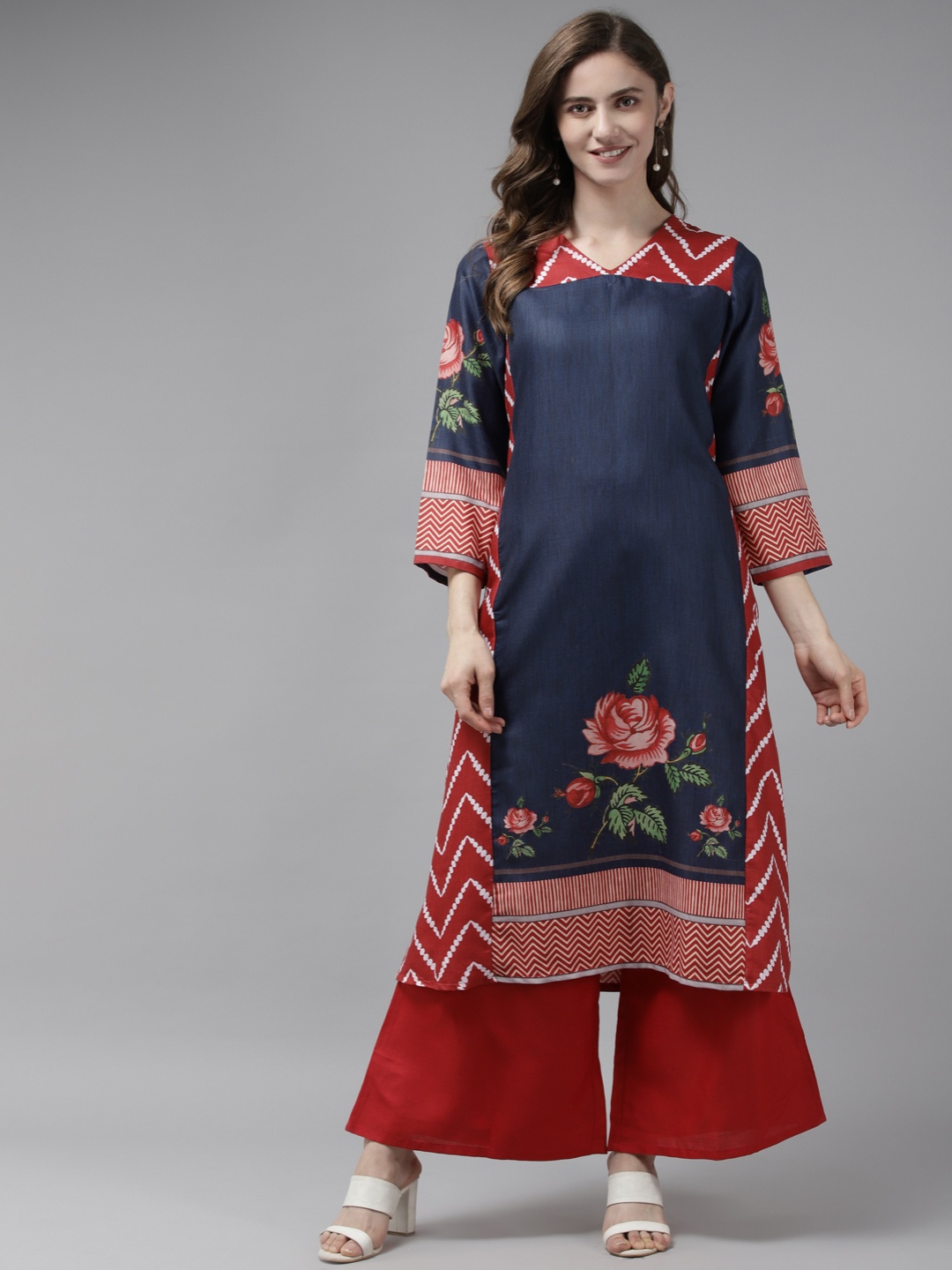 

Bhama Couture Women Blue Floral Printed Kurta with Palazzos