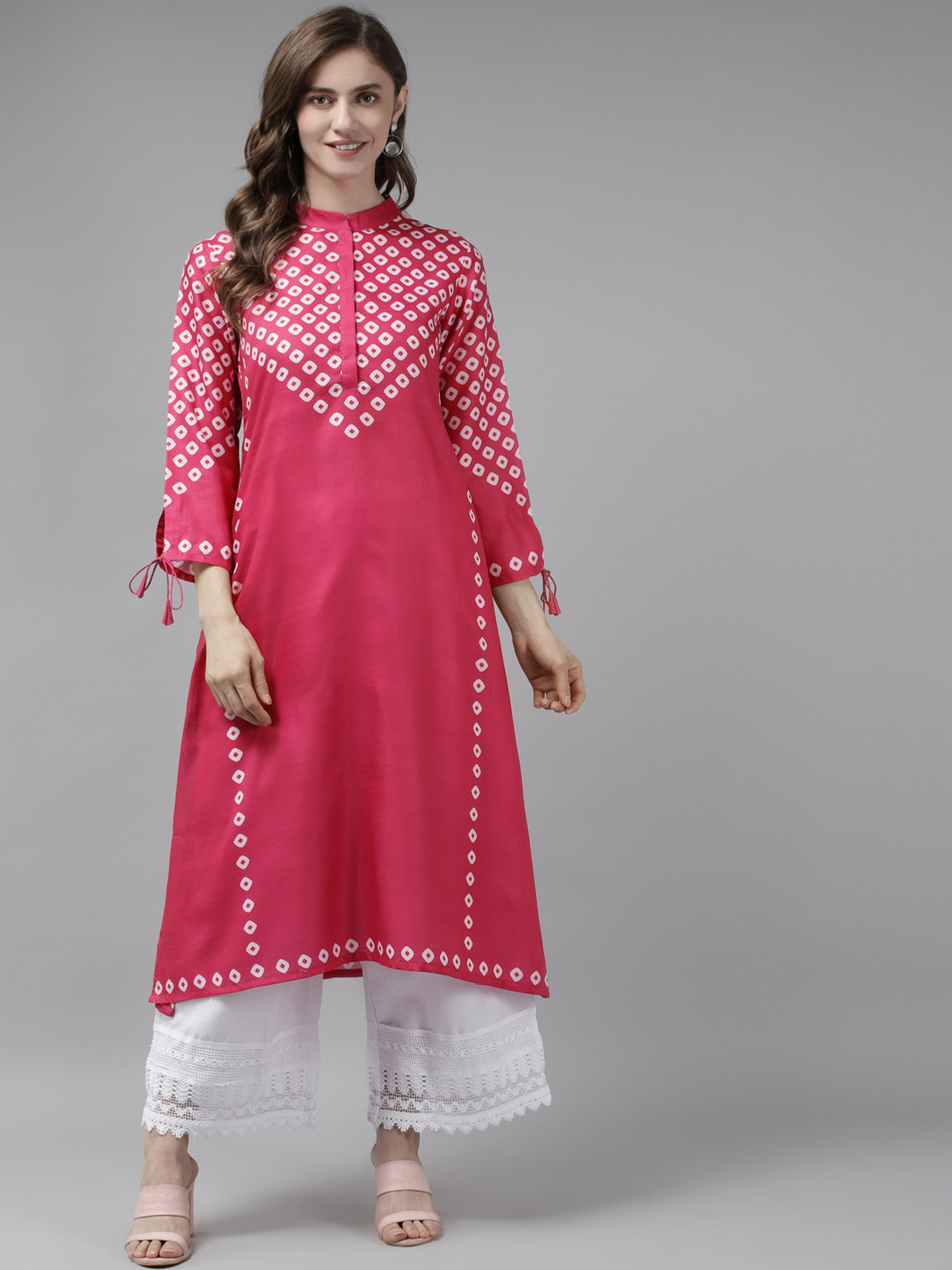 

Bhama Couture Women Pink Bandhani Print Kurta with Palazzos