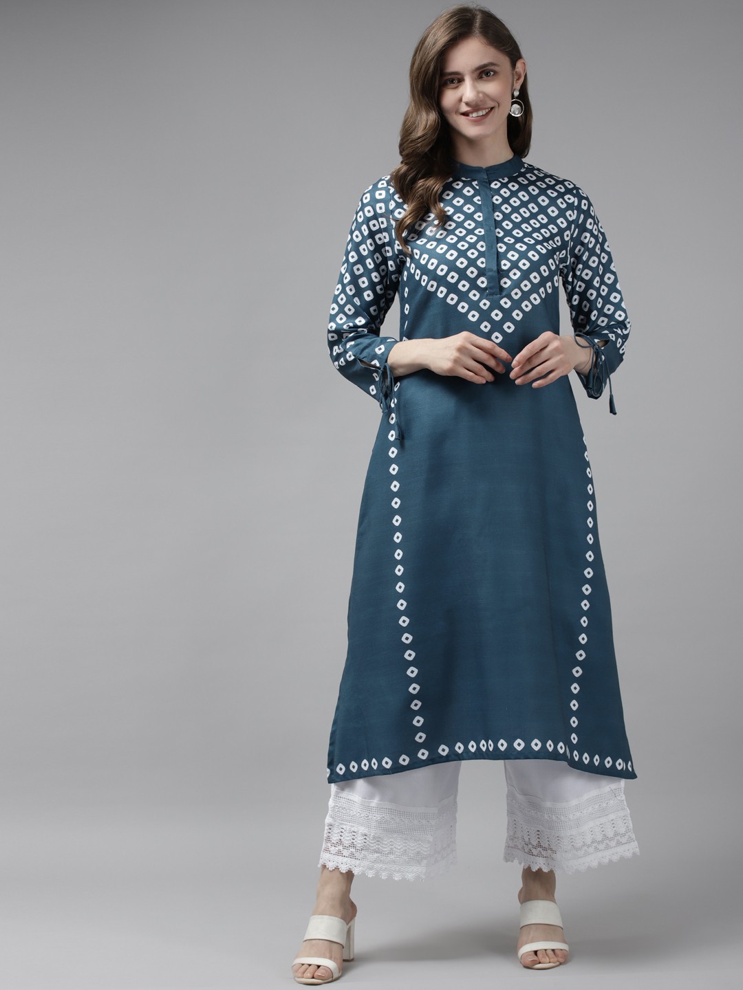 

Bhama Couture Women Blue Bandhani Print Kurta with Palazzos