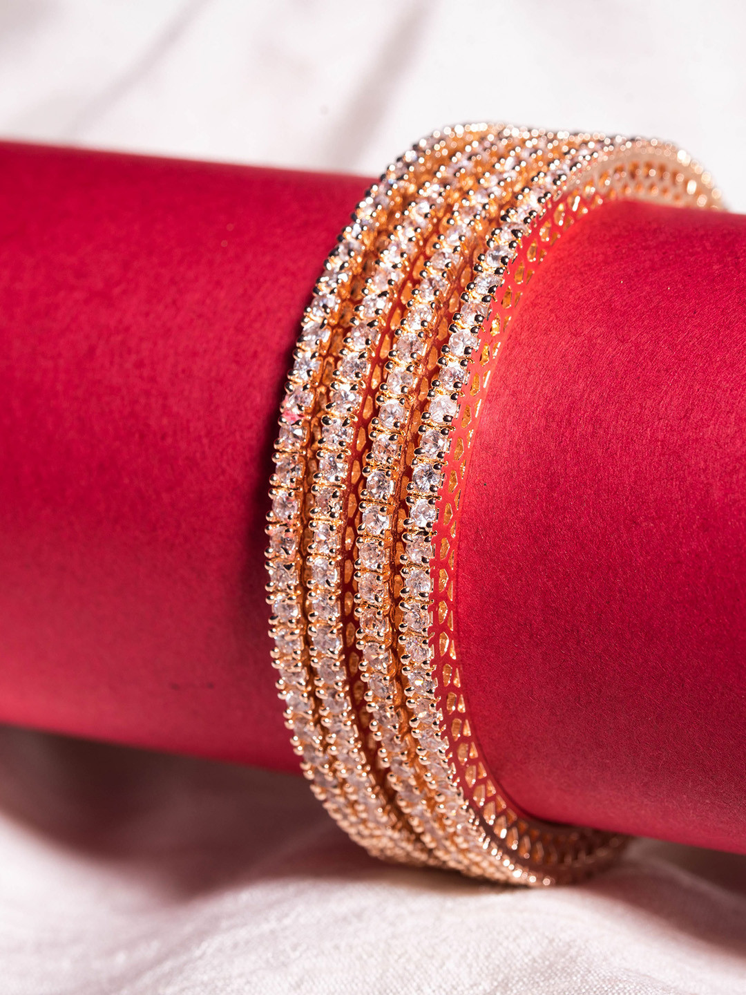 

Nathany Jewels Set of 4 Rose Gold Plated CZ Stone studded Bangles