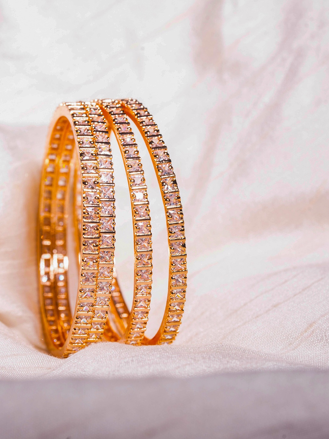 

Nathany Jewels Set of 4 Gold-Plated White AD Stone-Studded Bangle