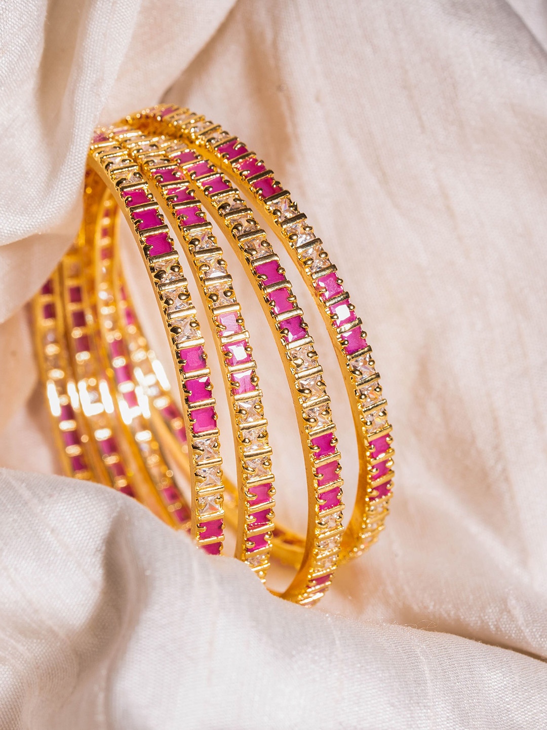 

Nathany Jewels Set Of 4 Gold-Plated White & Pink AD Studded Designer Single Line Style Bangles