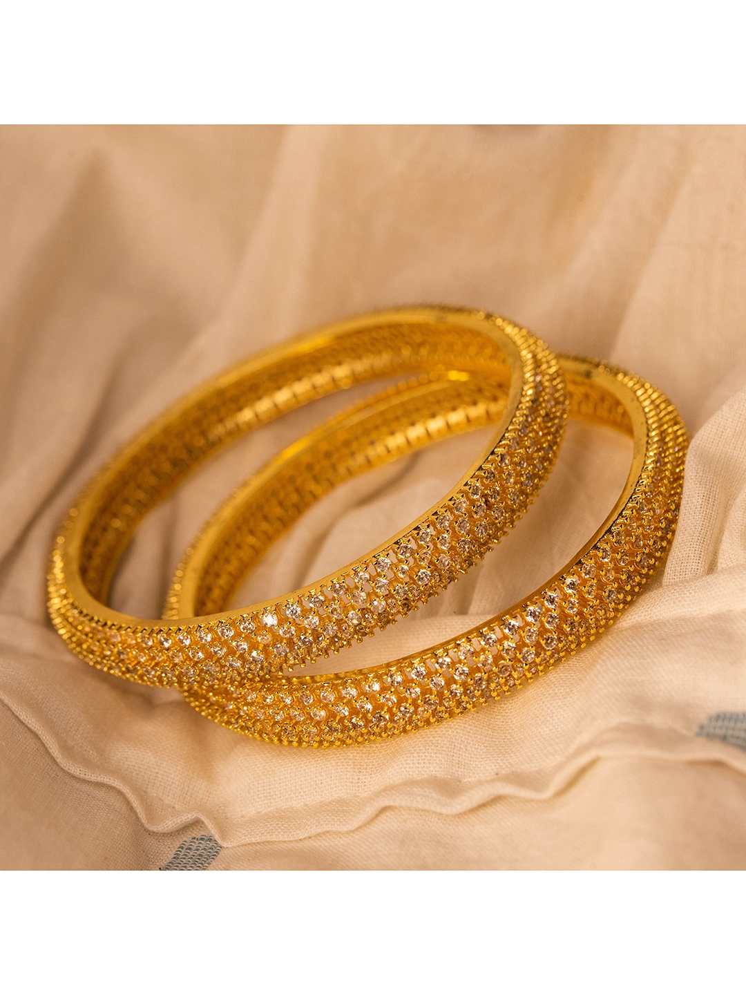 

Nathany Jewels Set of 2 Gold-Plated & White AD Stone-Studded Bangles