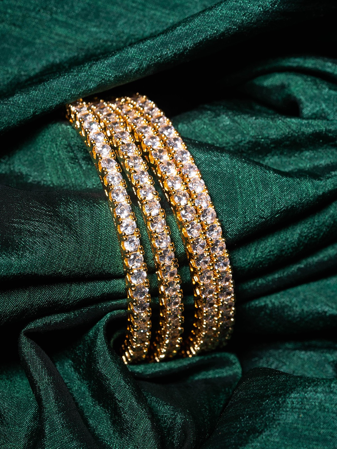 

Nathany Jewels Set Of 4 Gold-Plated White AD Studded Bangle