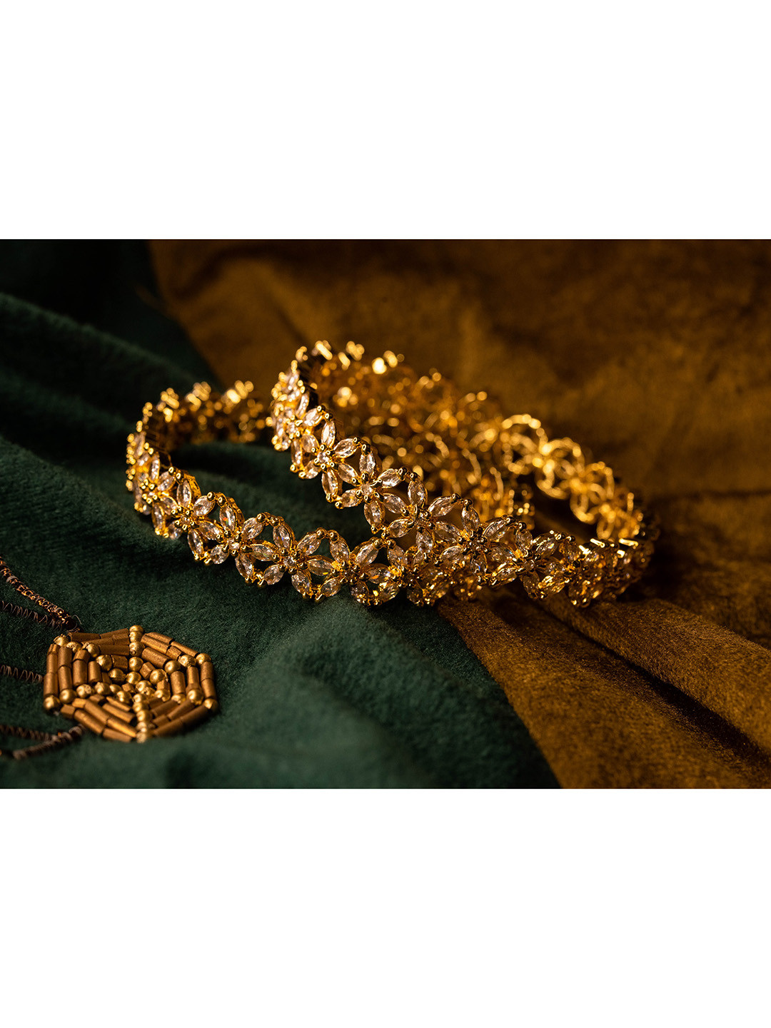 

Nathany Jewels Set of 2 Gold-Plated White CZ Stone Studded Bangles