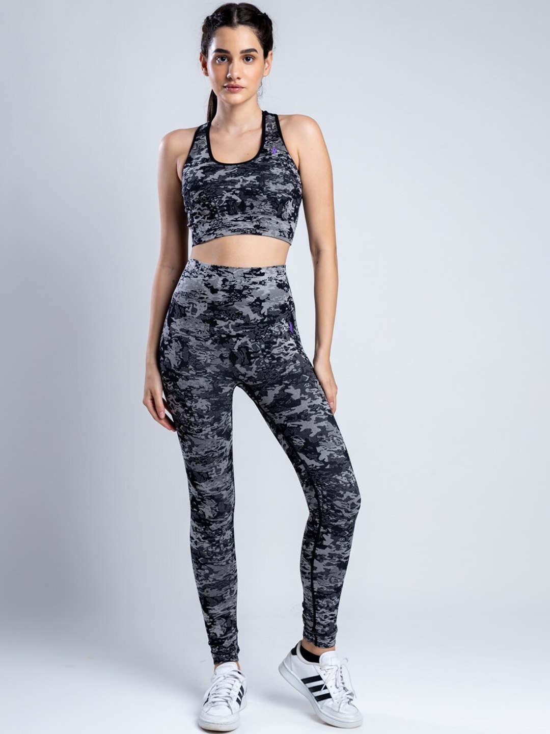 

SKNZ Women Black Camouflage Printed Tracksuits